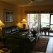 Our livingroom overlooking enclosed porch and pool. by bruni