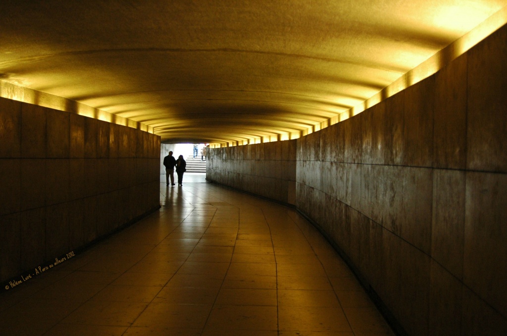 The tunnel thru the Arc de Triomphe by parisouailleurs