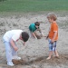 Boys Playing in the Sand by julie