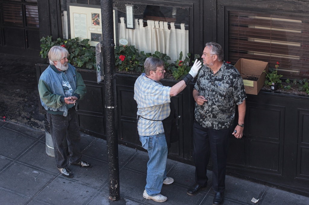 Looks Like He Is Going To Slap Him...Really Just Giving Directions! by seattle