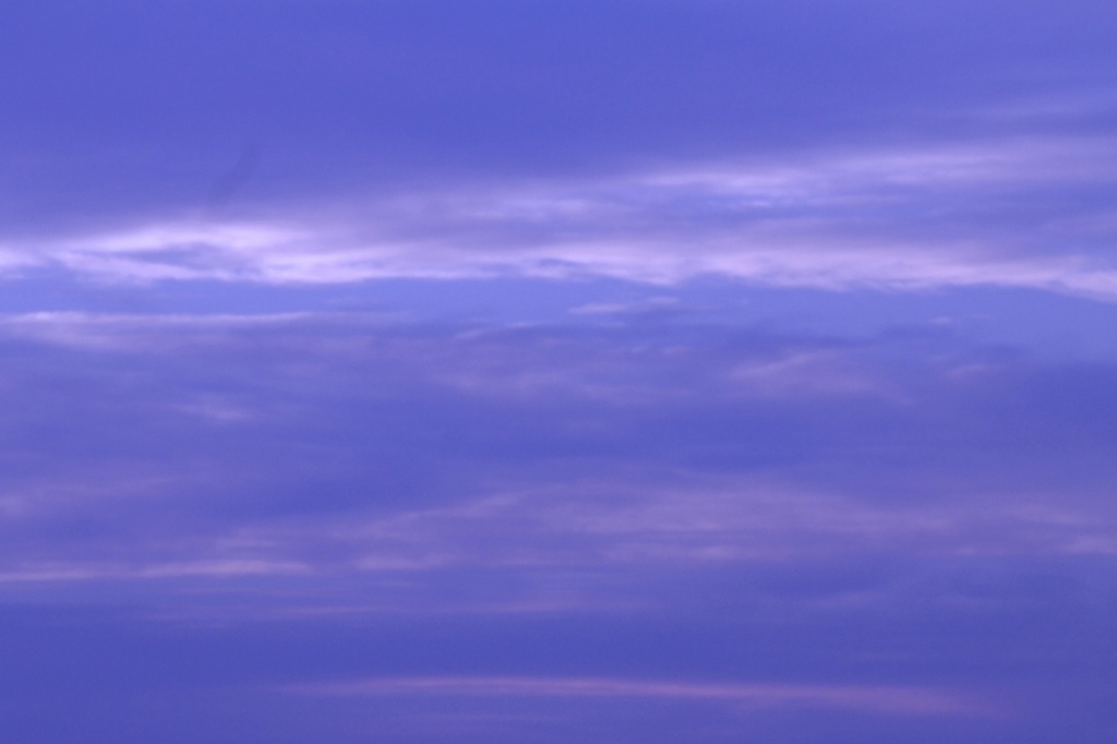 Purple and blues in evening sky by judyc57