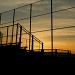 Sundown through the fence by mittens