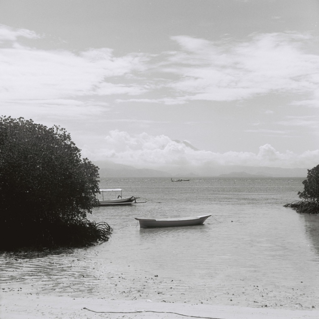 Distant Mt Agung by peterdegraaff