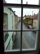 22nd Jun 2012 - Wet street through a rainy window