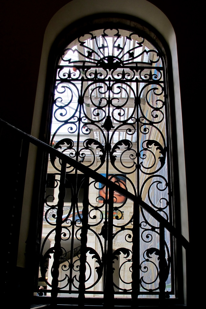 Rivera mural through staircase and window grate at Detroit Institute of Arts by corktownmum