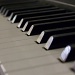 Light dancing on the piano keys by sugarmuser