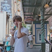 12th Aug 2012 - He Is Actually Using A Hand Held Battery Fan While Walking Around The Market