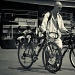 Man with Two Bikes by northy