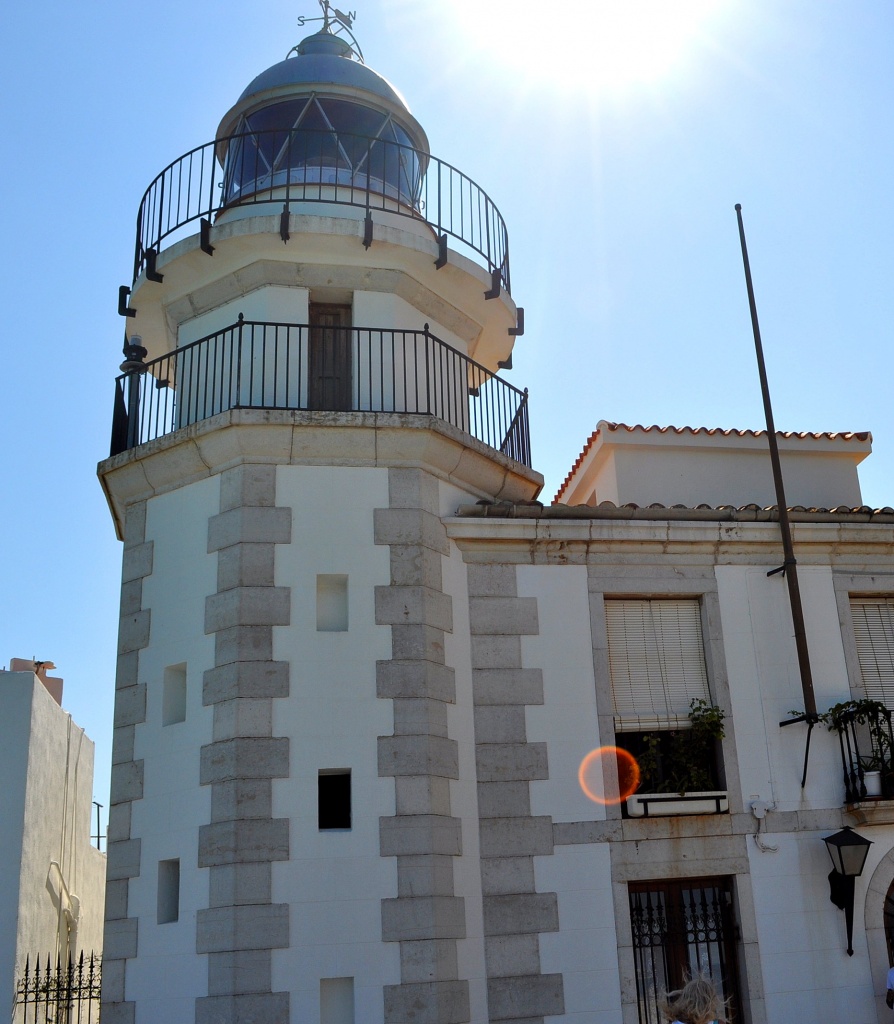Lighthouse with sunburst by philbacon