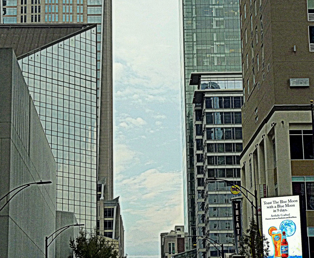 A Sky View Between Buildings by peggysirk