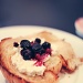 toasted croissant with ricotta and berries by pocketmouse