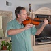 Eric tries the Violin by mariaostrowski