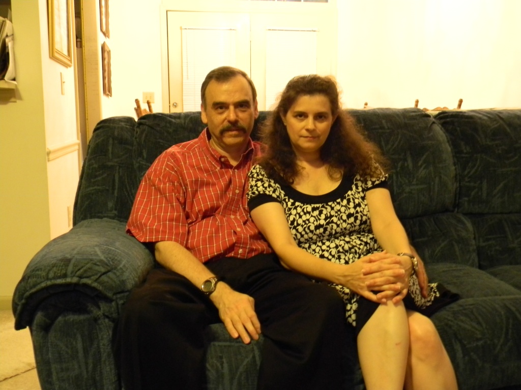 Mom and Dad on Couch 9.8.12  by sfeldphotos
