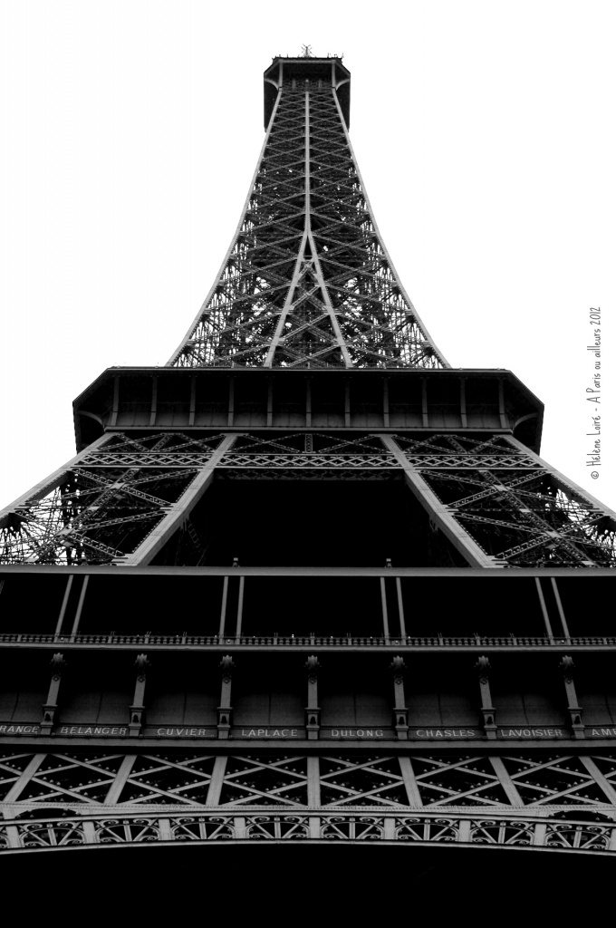 At the bottom of the Eiffel Tower by parisouailleurs