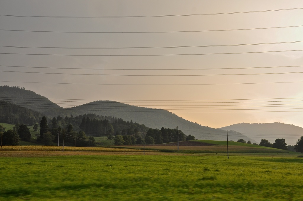 Electric lines in swiss landscape by cocobella