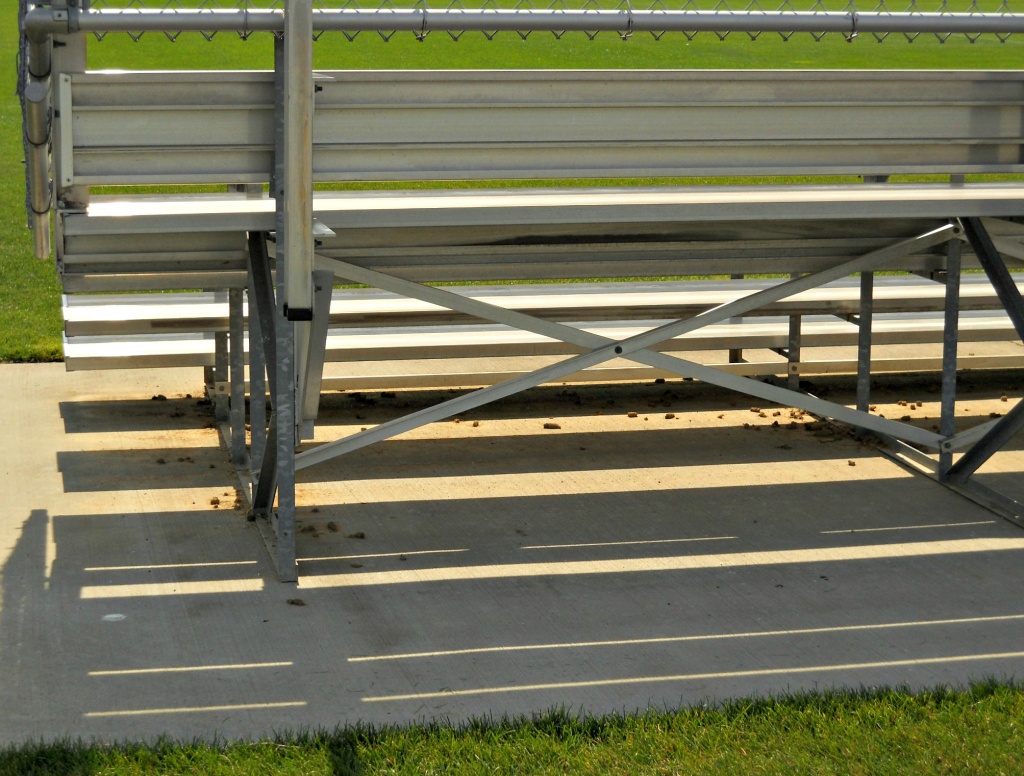 Bleachers, shadows and light by mittens