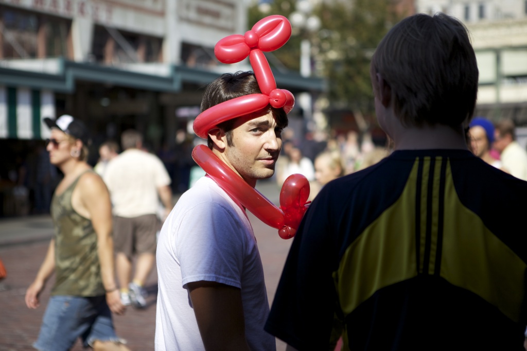 The Newest Style In Balloon Hat Wear... Knows He Has Been Captured! by seattle