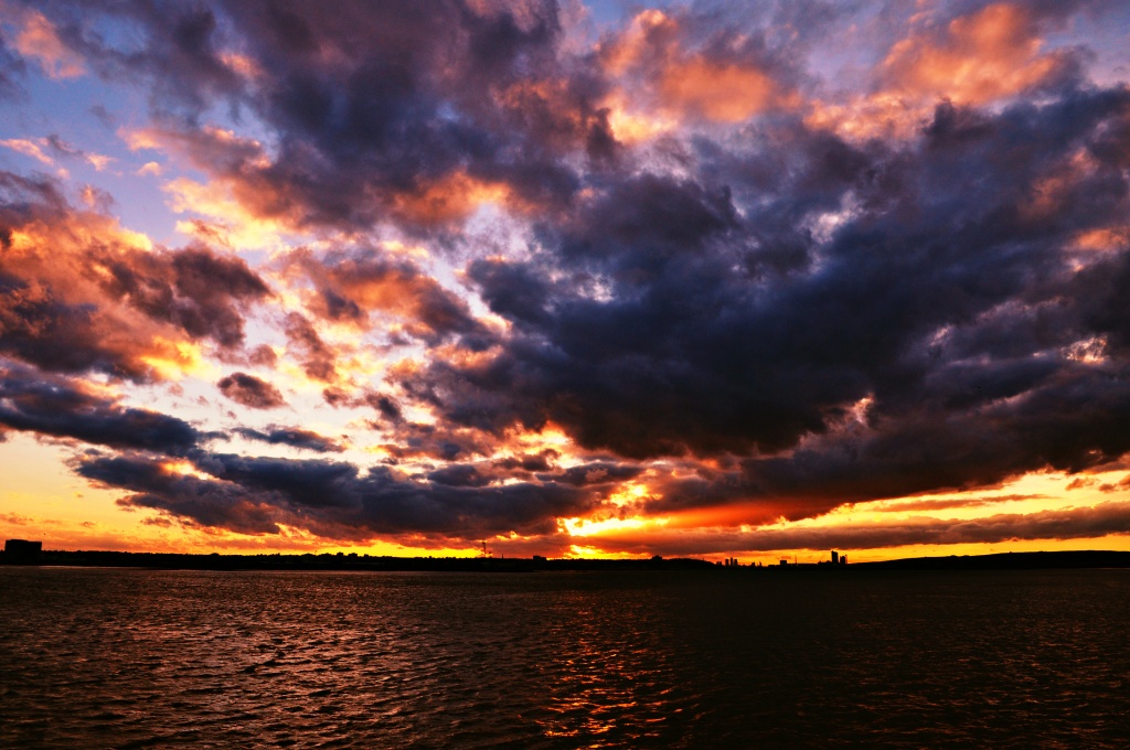 Stormy Sunset by andycoleborn