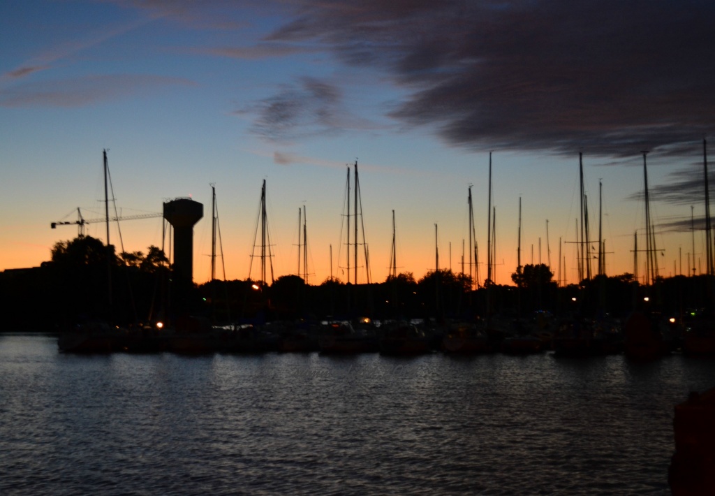 pretty sailboats at dusk by summerfield