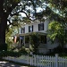 A beautiful old house in The Village section of Mt. Pleasant, SC, complete with picket fence, purple morning glories, and a huge oak tree.   by congaree