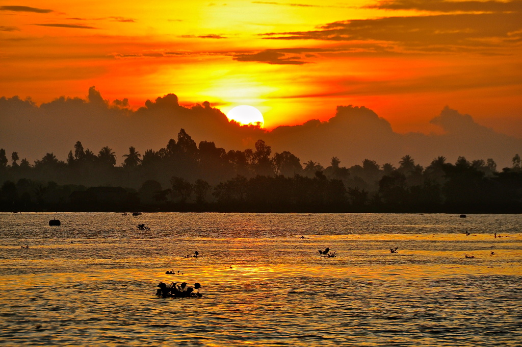 Sunrise on the Mekong, Vietnam by cocobella