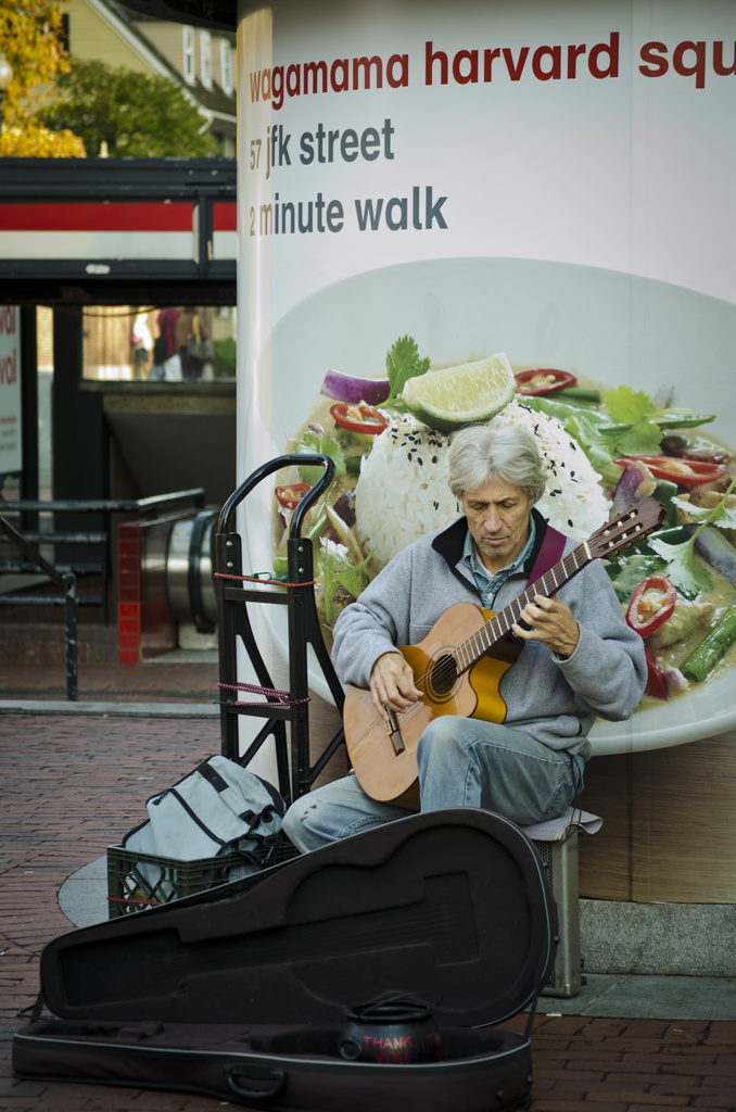 Street musician at Harvard Square by ggshearron