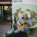 Street musician at Harvard Square by ggshearron