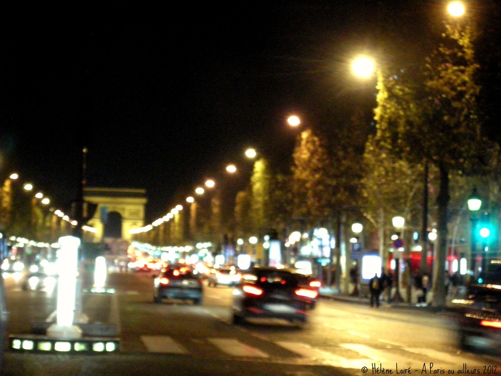 Driving thru the Champs Elysées by parisouailleurs