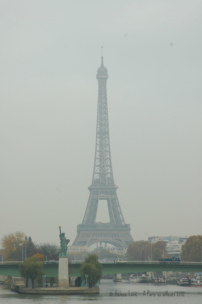 Misty Statue of Liberty & Eiffel Tower  by parisouailleurs