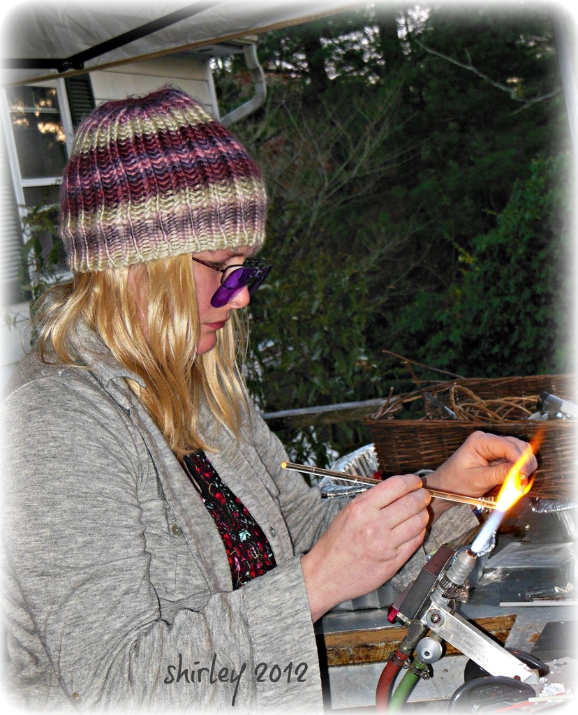 Sandy and her lampworking by mjmaven
