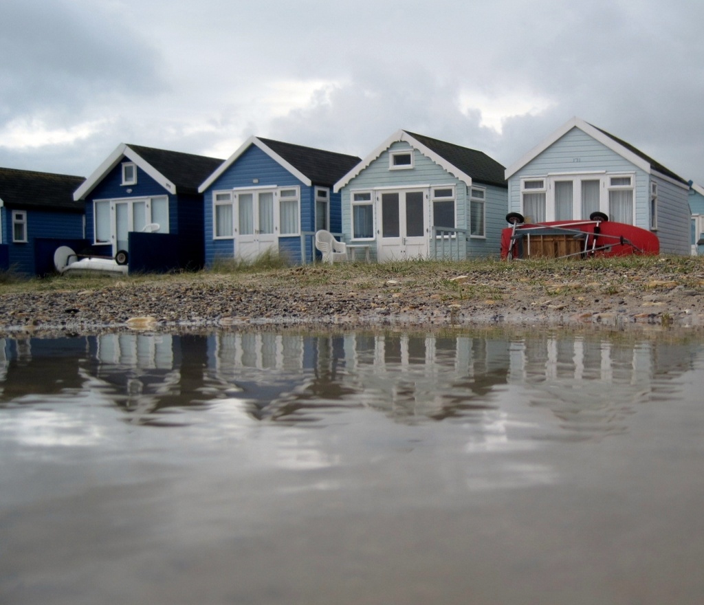 'Reflections': beach huts out of 'season'. by quietpurplehaze
