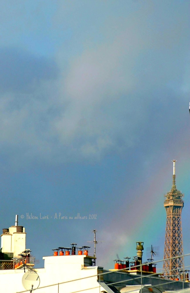 Rainbow over the Eiffel tower by parisouailleurs