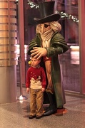 18th Dec 2012 - A Little Boy In The Dreaded Christmas Sweater Being Protected By Herr Drosselmeyer From The Nutcracker.