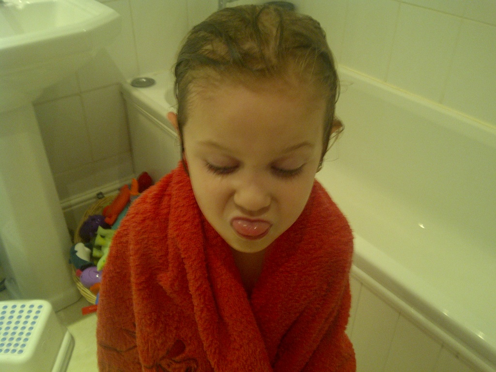 Milly making faces after bath by tallgate