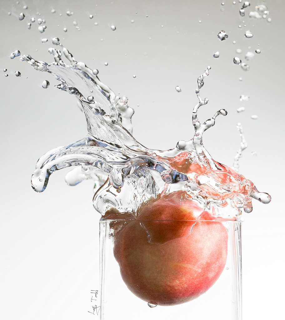 waterworld -- juggling summer fruit by ltodd