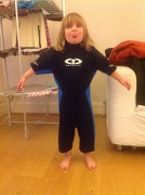 7th Jan 2013 - Milly trying on Sam's old wetsuit.