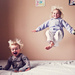 Two little monkeys jumping on the bed by kiwichick