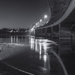 black and white Waldport bridge at Night by jgpittenger