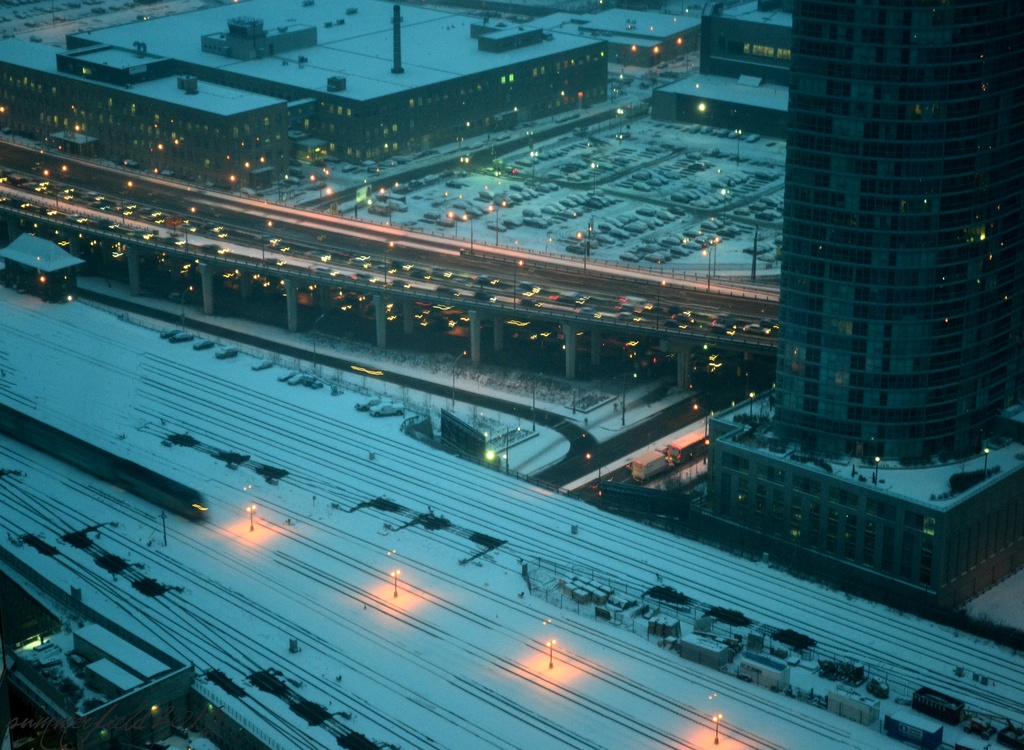 snow and traffic at dusk by summerfield