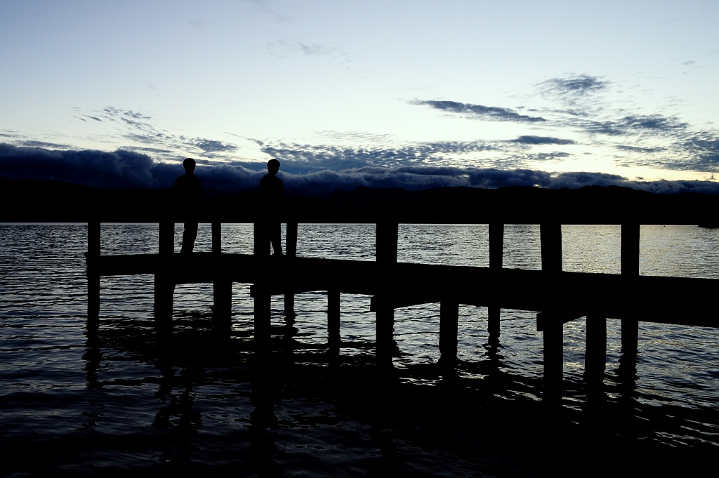 Silhouettes on a Jetty by andycoleborn