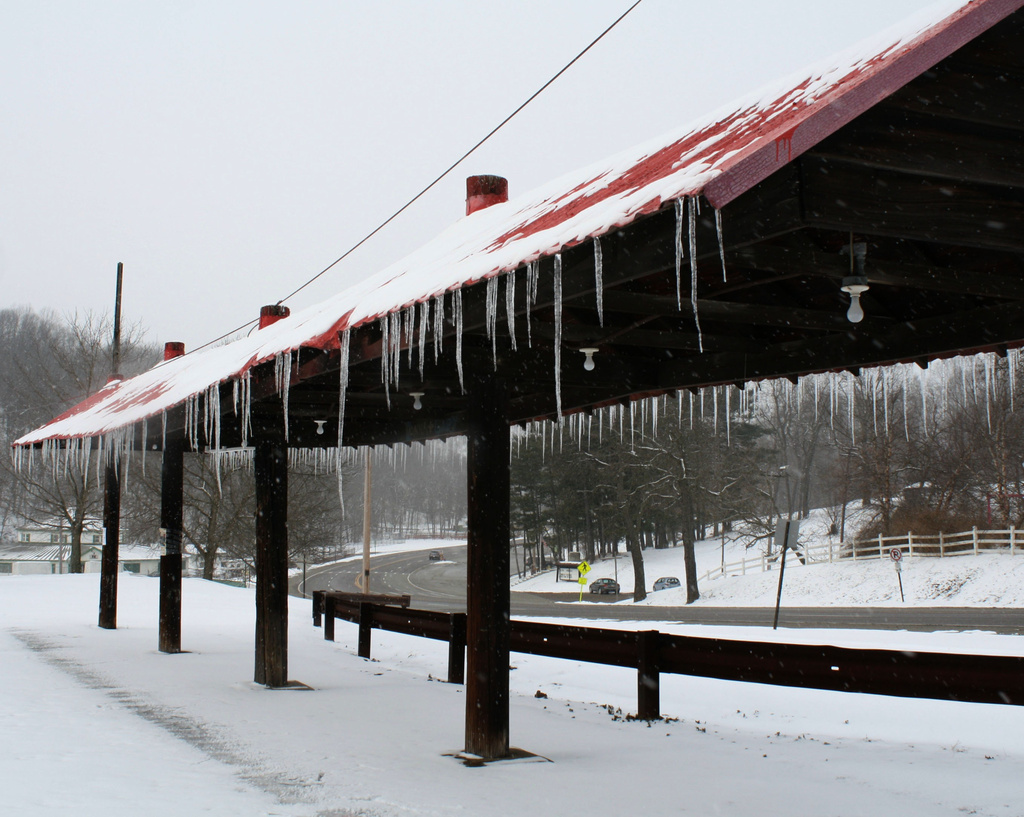 Icicles on a roof by mittens