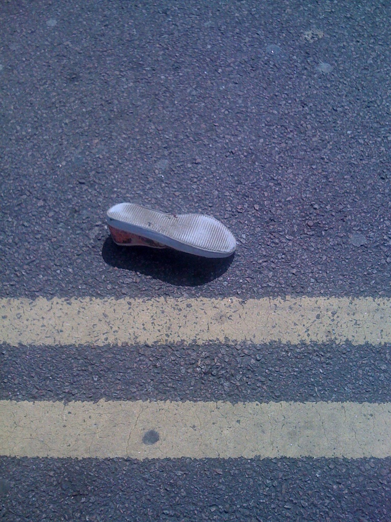 Abandoned shoe by manek43509