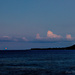 Red Full Moon Setting Into Kealakekua Bay  by jgpittenger