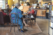 28th Feb 2013 - Coffee At Starbucks This Morning On Mercer Island, Loved This Woman's Coat, Dress and Shoe!  Happy Friday!