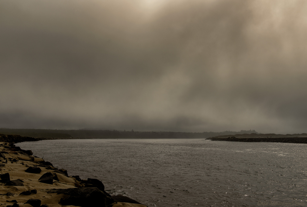 Heavy Cloud Cover At the North Jetty  by jgpittenger