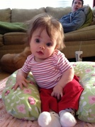12th Mar 2013 - Sitting up by herself (well, ok, she had a little help from the pillow)