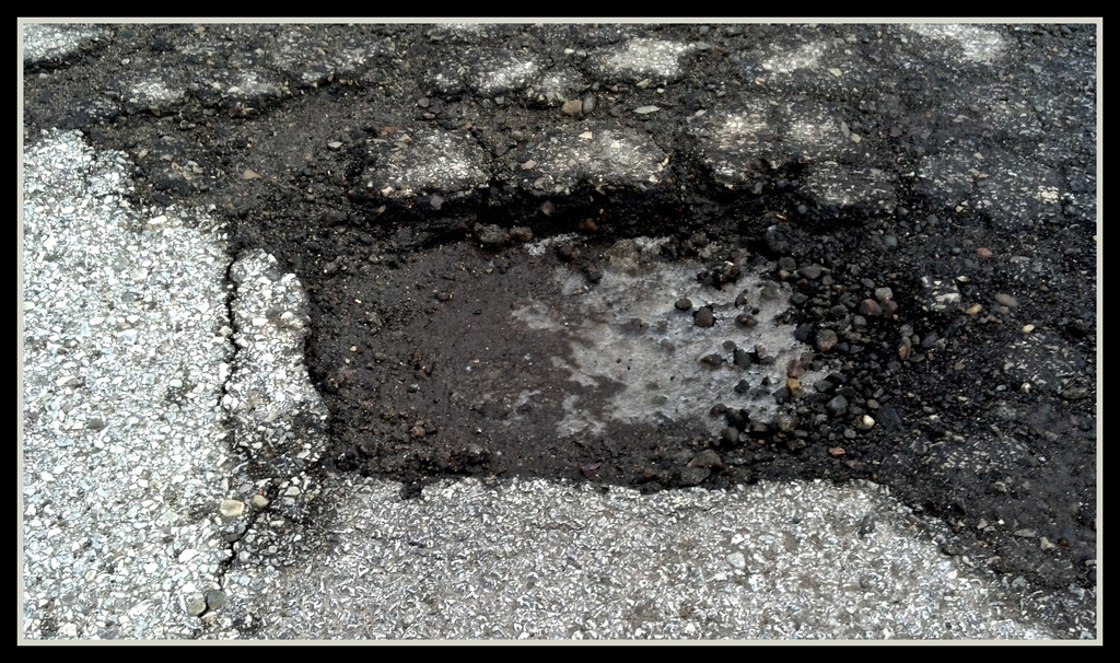 Street #19:  Baby Pothole by houser934
