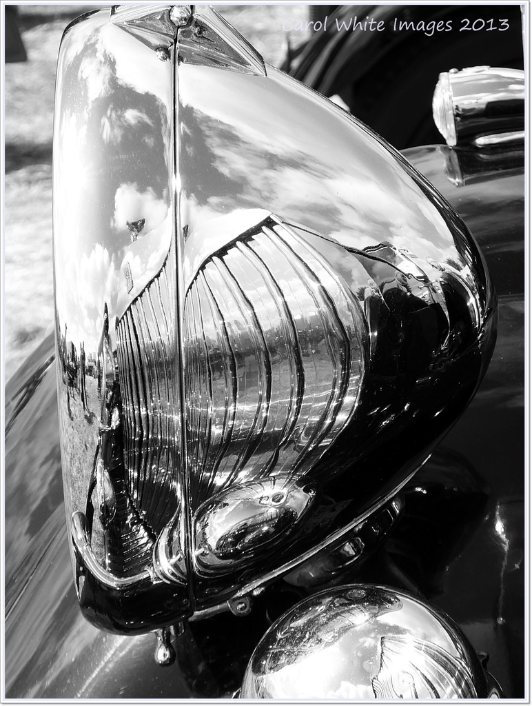 Reflections In A Roller Headlamp by carolmw