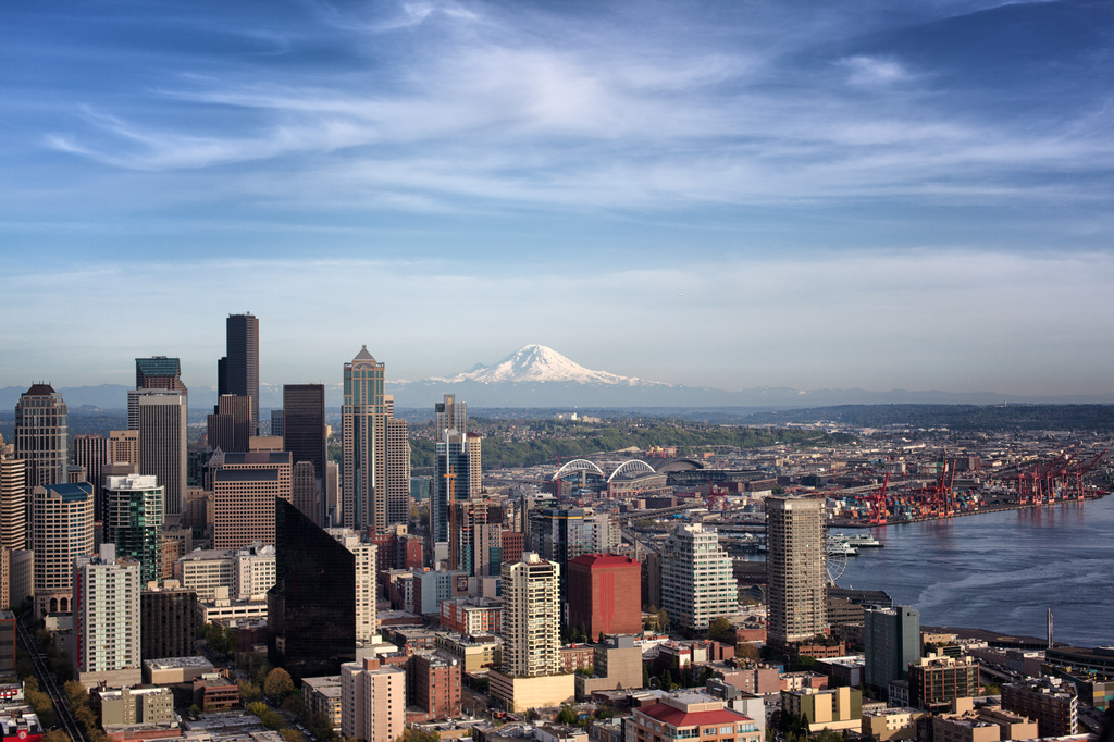 Seattle is delighted by a showing of Mount Rainier in the background. Located 54miles (87 km) southeast of Seattle. by seattle