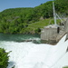 Water over Wilbur Dam by calm